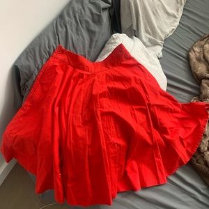 red zara midi a- line skirt with pockets. zipper closure, pre loved